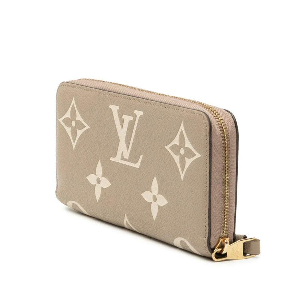Louis Vuitton Long Monogram Wallet Empreinte Bicolor Cream Zippy Tourtrell Cream